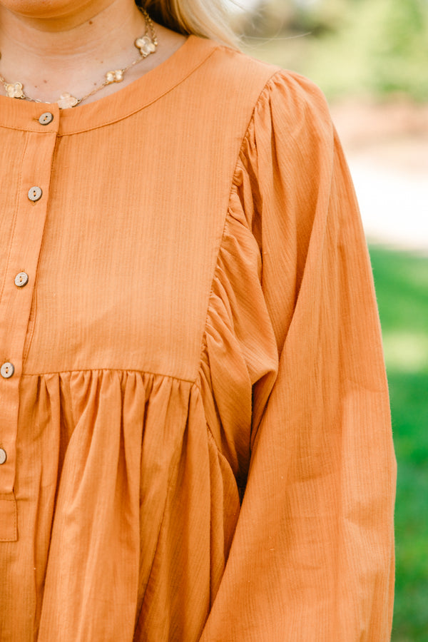 Chic Soul plus size clothing, orange long sleeve top with flutter sleeves and buttons half way down