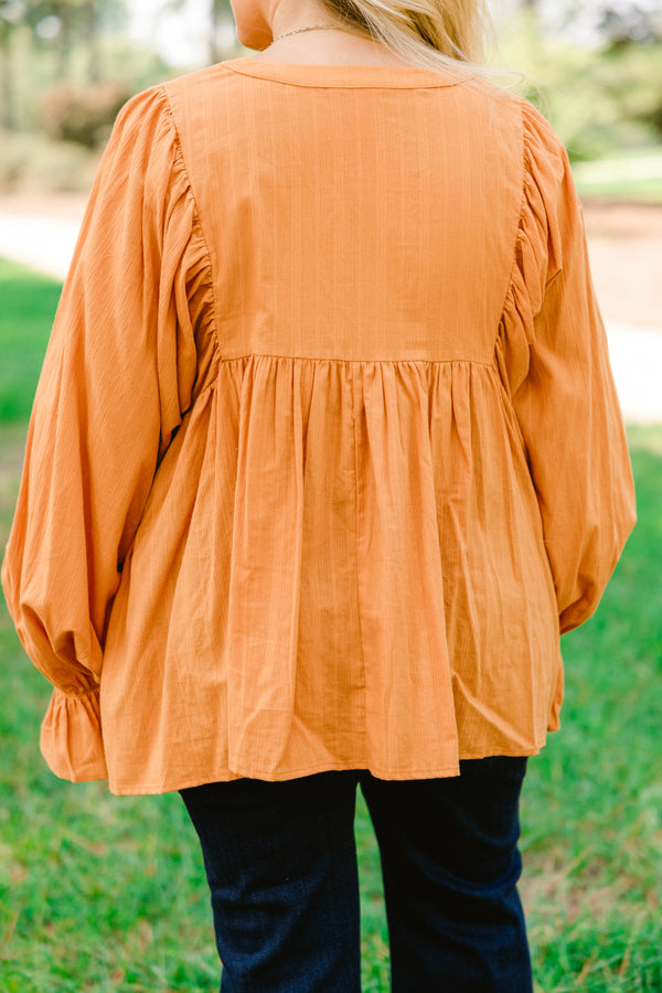 Chic Soul plus size clothing, orange long sleeve top with flutter sleeves and buttons half way down