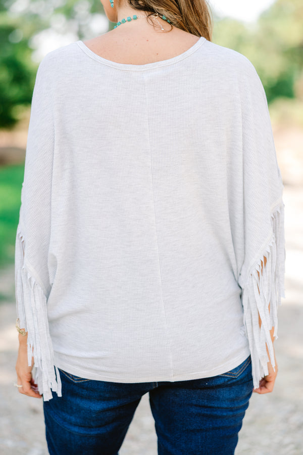 Chic Soul plus size clothing, heather gray top with a wild west graphic on the center of the shirt and fringe details at the end of each sleeve 
