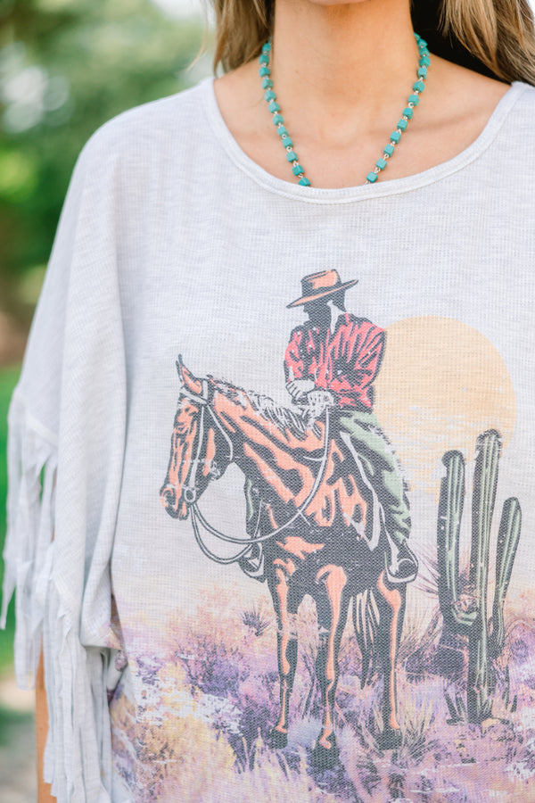 Chic Soul plus size clothing, heather gray top with a wild west graphic on the center of the shirt and fringe details at the end of each sleeve 
