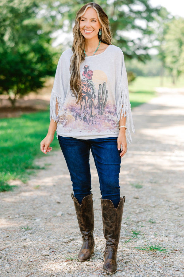 Chic Soul plus size clothing, heather gray top with a wild west graphic on the center of the shirt and fringe details at the end of each sleeve 