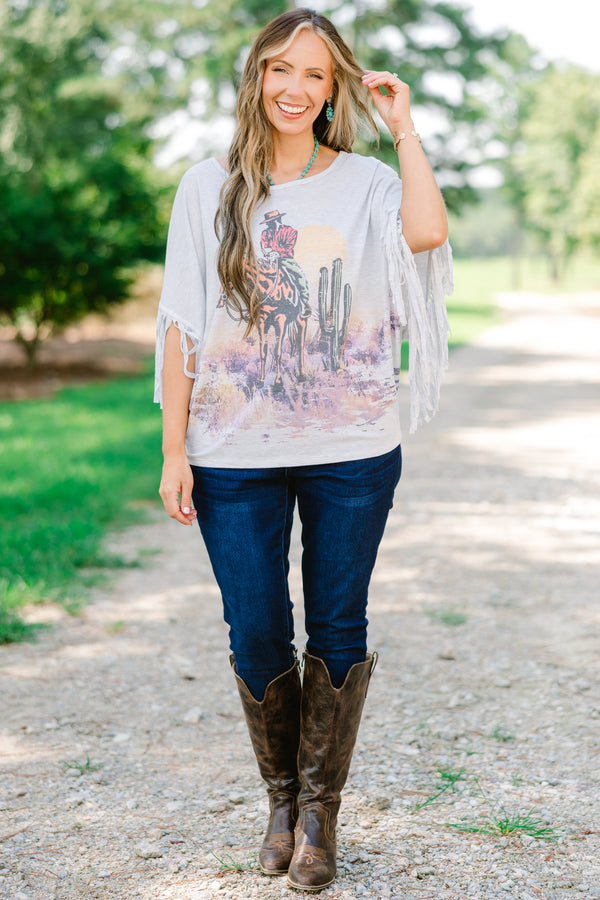 Chic Soul plus size clothing, heather gray top with a wild west graphic on the center of the shirt and fringe details at the end of each sleeve 