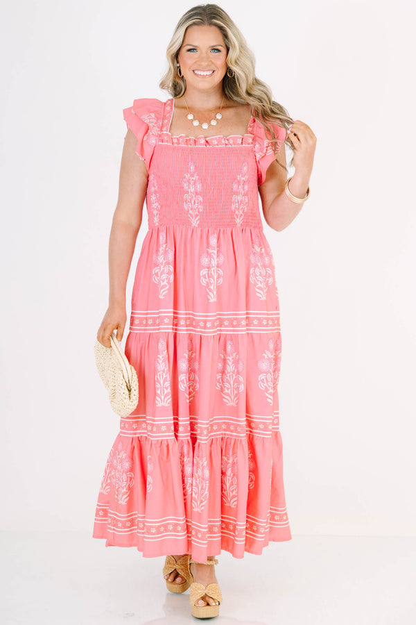 Plus Size bubblegum pink floral maxi dress with smocked bodice, flutter sleeves, and tiered skirt.