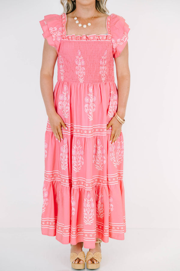 Plus Size bubblegum pink floral maxi dress with smocked bodice, flutter sleeves, and tiered skirt.