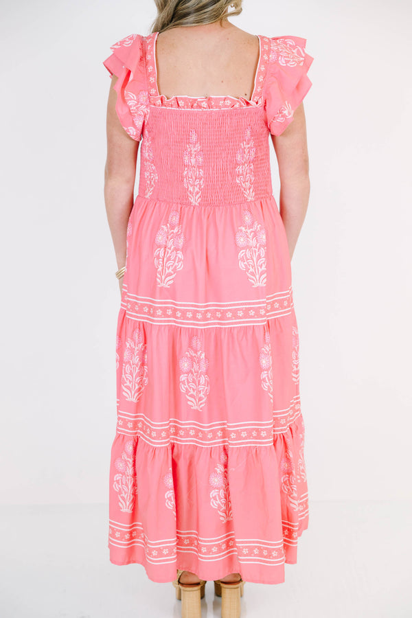 Plus Size bubblegum pink floral maxi dress with smocked bodice, flutter sleeves, and tiered skirt.