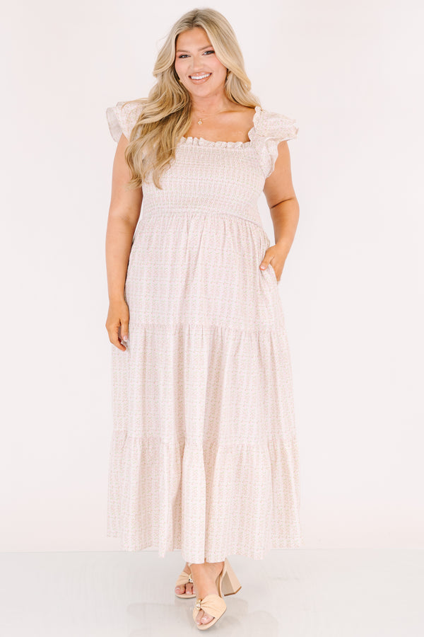 Chic Soul plus size clothing, pink maxi tiered maxi dress with a smocked texture on the bust a square neckline and flutter sleeves as well as a small floral pattern throughout 