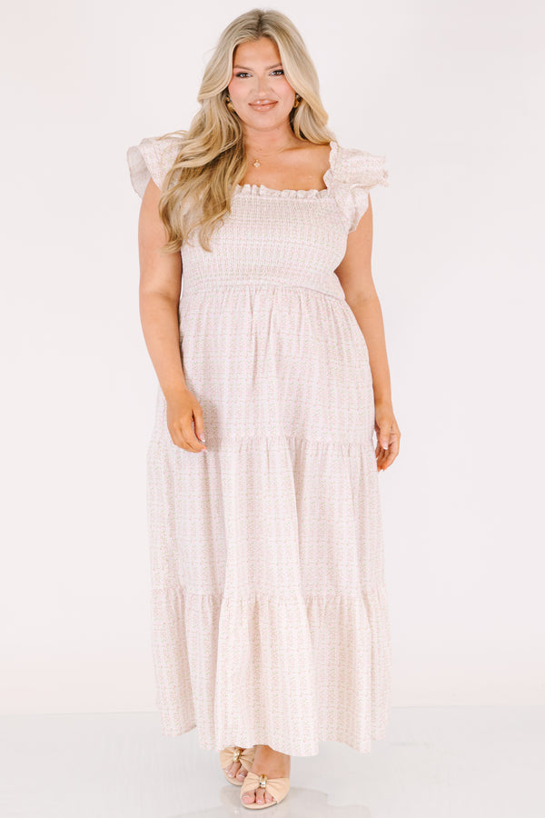 Chic Soul plus size clothing, pink maxi tiered maxi dress with a smocked texture on the bust a square neckline and flutter sleeves as well as a small floral pattern throughout 