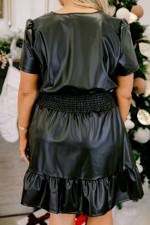 Chic Soul plus size clothing, black short sleeve faux leather mini dress with cinched smocked waist with v cutout along neckline with ruffle along bottom