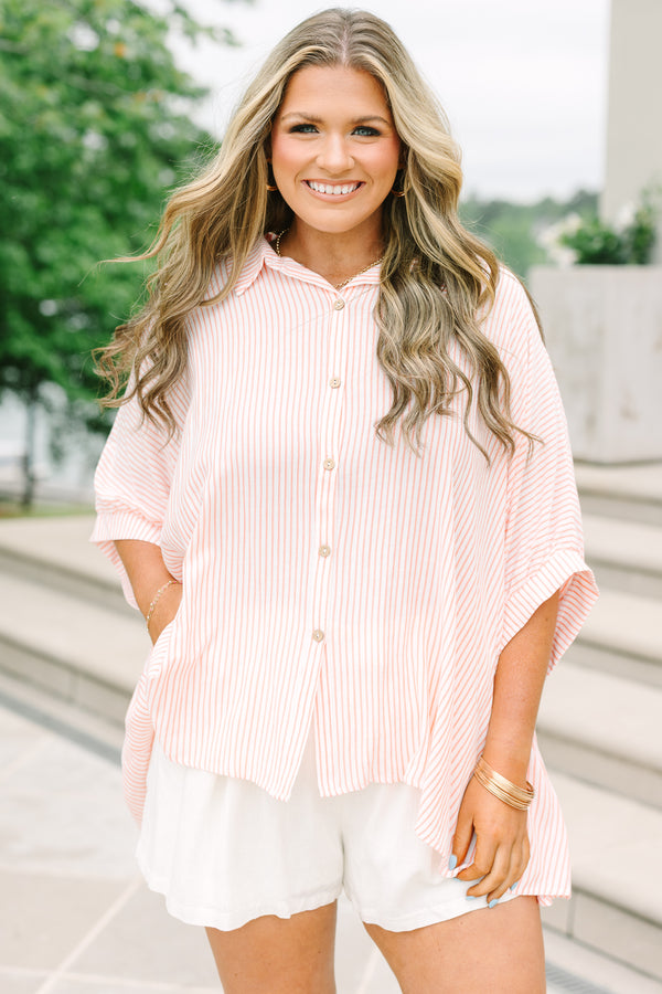 Plus Size relaxed coral and white striped button-up top with dolman sleeves and white shorts.