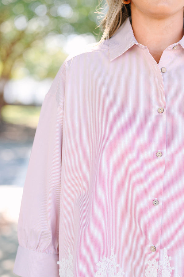 Plus Size rust stripe button-down top with long puff sleeves and a white lace hem.