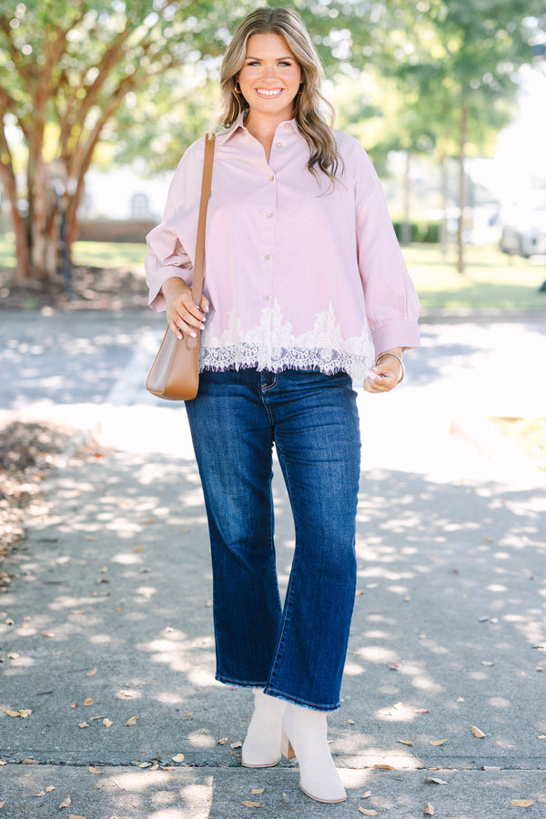 Plus Size rust stripe button-down top with long puff sleeves and a white lace hem.