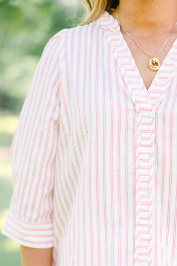 Plus Size pink and white striped 100% cotton top with three-quarter sleeves and a v-neckline.