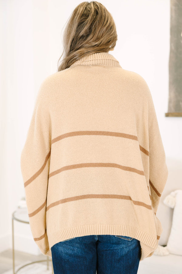 Plus Size taupe oversized turtleneck sweater with horizontal brown stripes and ribbed trim.