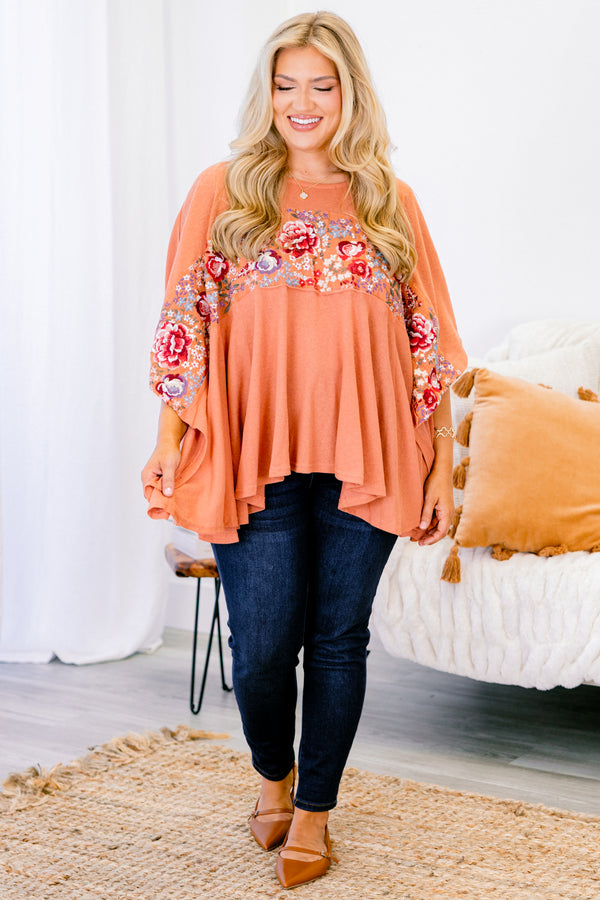 Chic Soul plus size clothing, terracotta short sleeve top with an embroidered floral pattern going across the chest and onto the sleeves