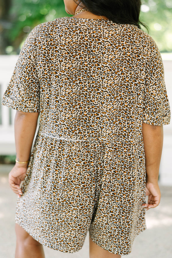 Plus Size brown leopard print romper with short sleeves, a V-neckline, and front button details.