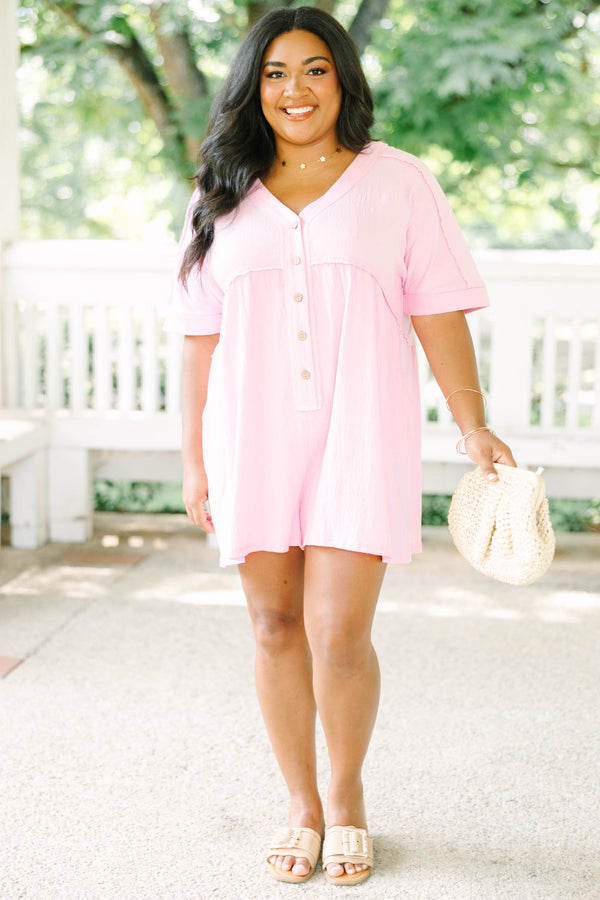 Plus Size orchid pink short sleeve romper with a V-neckline and button-down front detail.