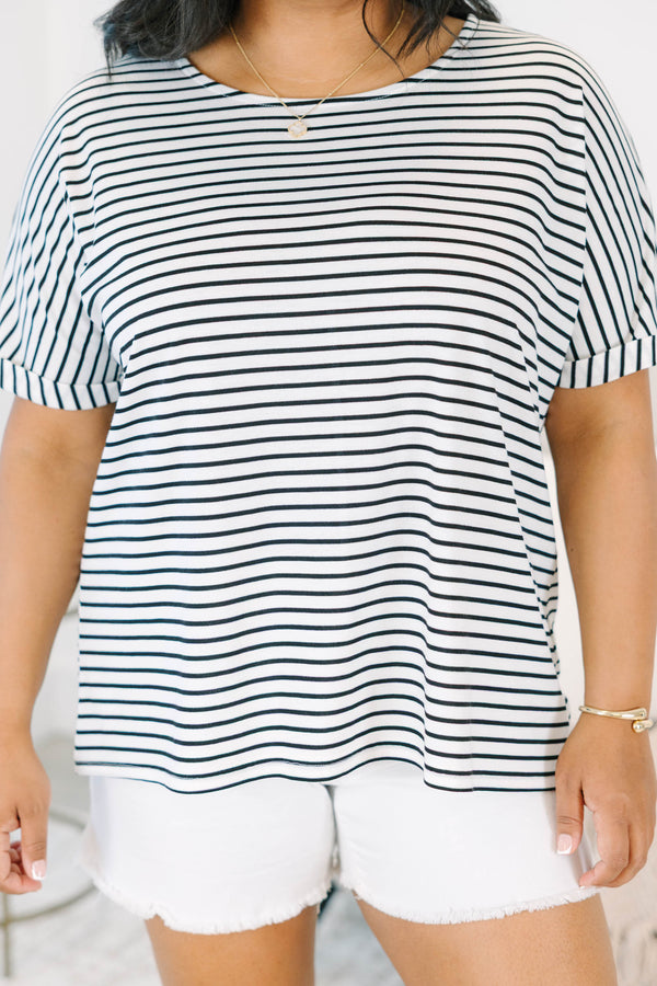 Plus Size black and white horizontal striped short sleeve top with a crew neckline and cuffed arms.