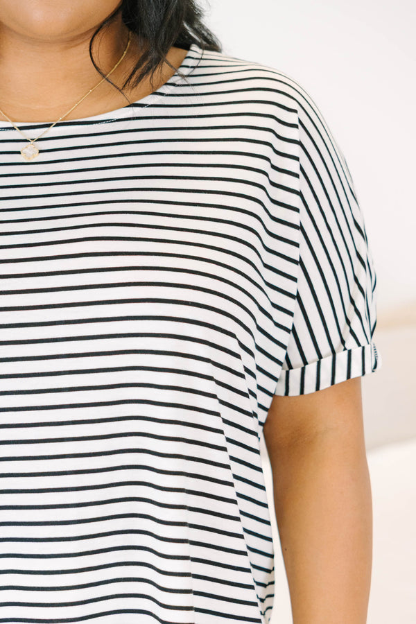 Plus Size black and white horizontal striped short sleeve top with a crew neckline and cuffed arms.