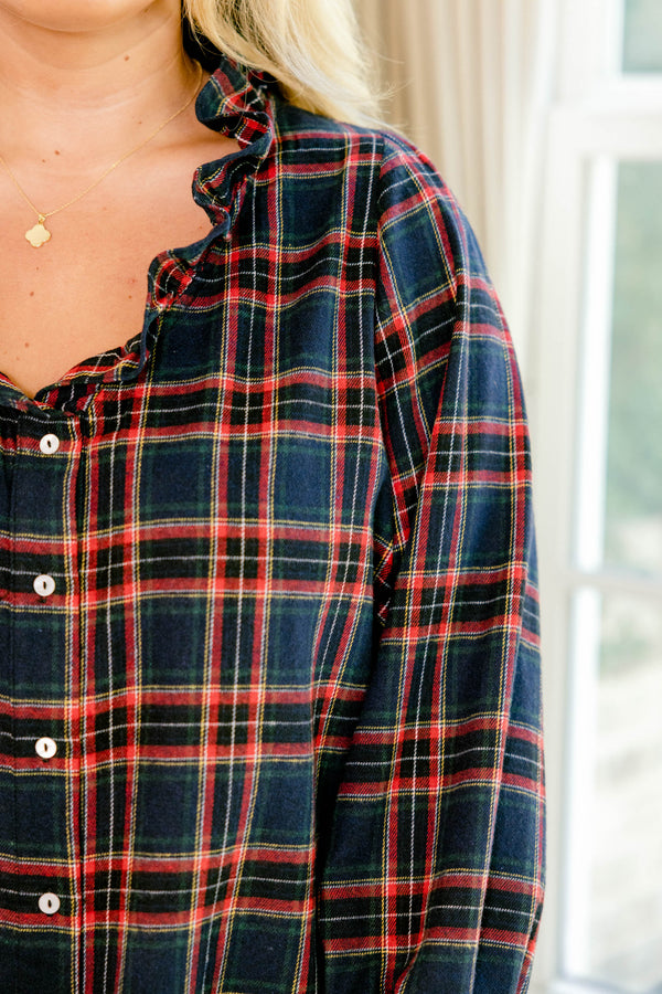Chic Soul plus size clothing, navy long sleeve plaid button up top with a v neckline and ruffles around the neckline and sleeves 