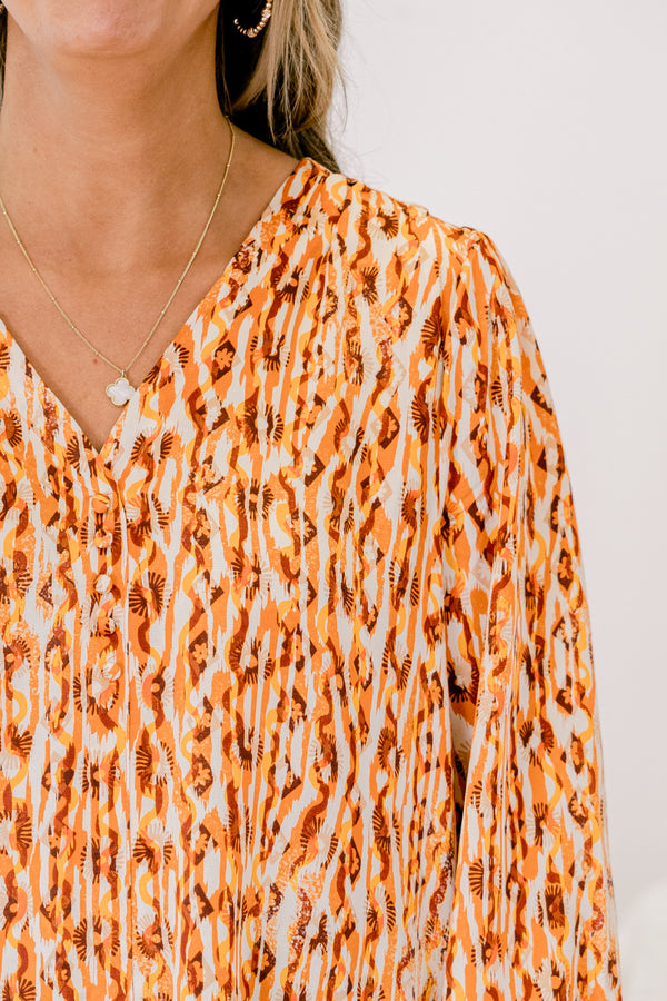 Chic Soul plus size clothing, mustard and red abstract pattern long sleeve top with cinched sleeves at the wrist