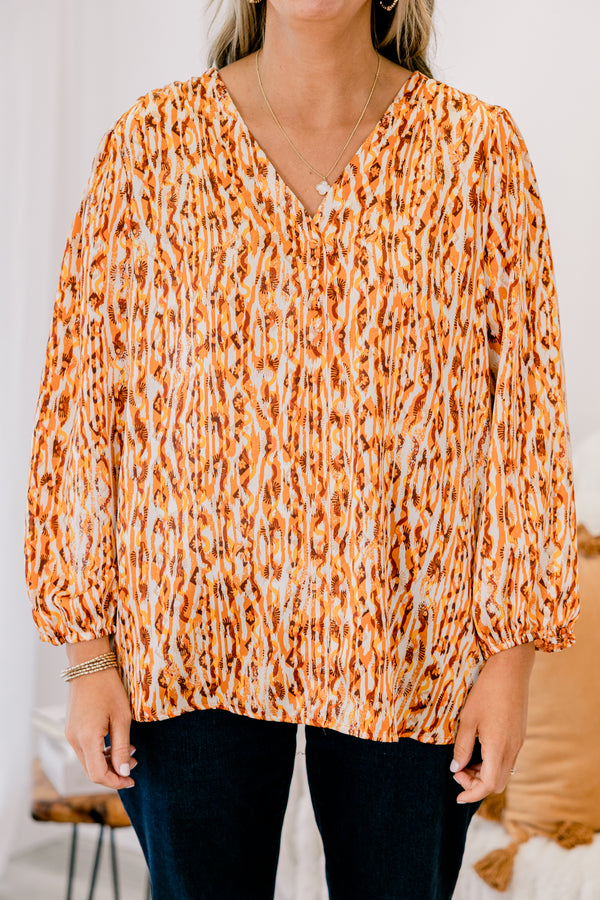 Chic Soul plus size clothing, mustard and red abstract pattern long sleeve top with cinched sleeves at the wrist