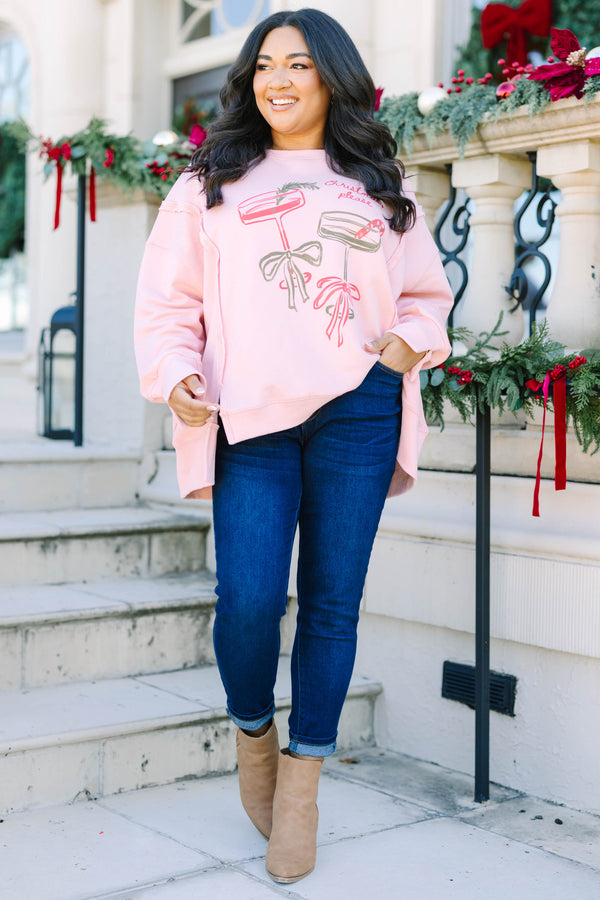 Plus size dusty pink cotton crewneck with a Christmas cocktail graphic and relaxed fit.