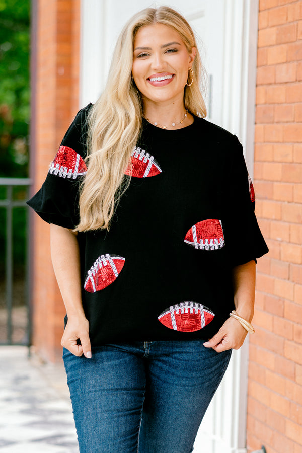 Chic Soul plus size clothing, black top with bubble sleeves that has red sparkly football patches throughout the shirt 