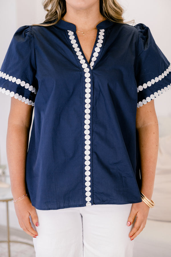 Chic Soul plus size clothing, navy bell sleeve v neck top with white dot trim around the neckline, midline, and sleeve