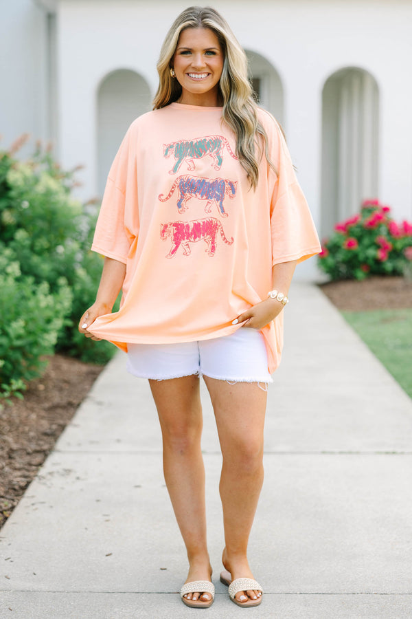 Plus Size neon coral oversized boyfriend tee with three colorful graphic tigers and white shorts.