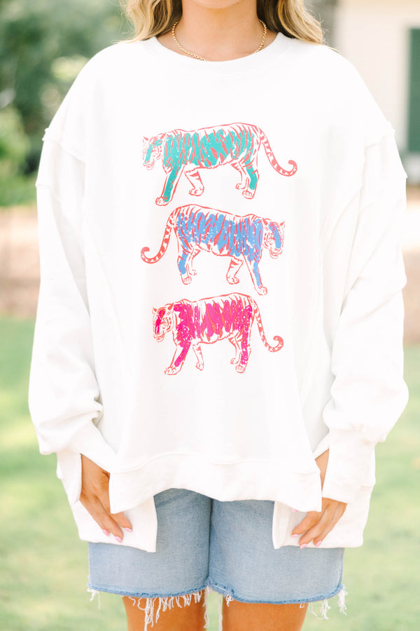 Plus size ivory crew sweatshirt with colorful tiger graphics.