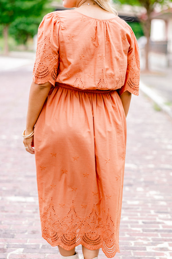 Chic Soul plus size clothing, orange short sleeve midi dress with v-neck and tie belt at the waist and embroidered detailing on the sleeves, top, and hem of the dress