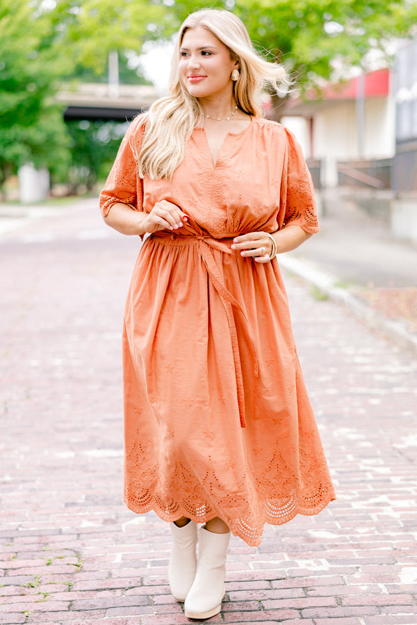 Chic Soul plus size clothing, orange short sleeve midi dress with v-neck and tie belt at the waist and embroidered detailing on the sleeves, top, and hem of the dress