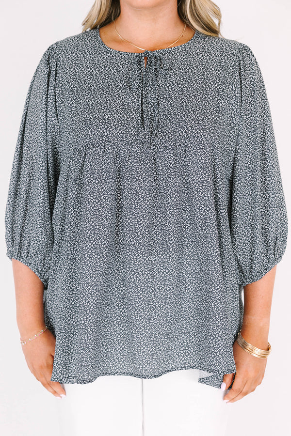 Chic Soul plus size clothing, black top with white pattern and bubble sleeves