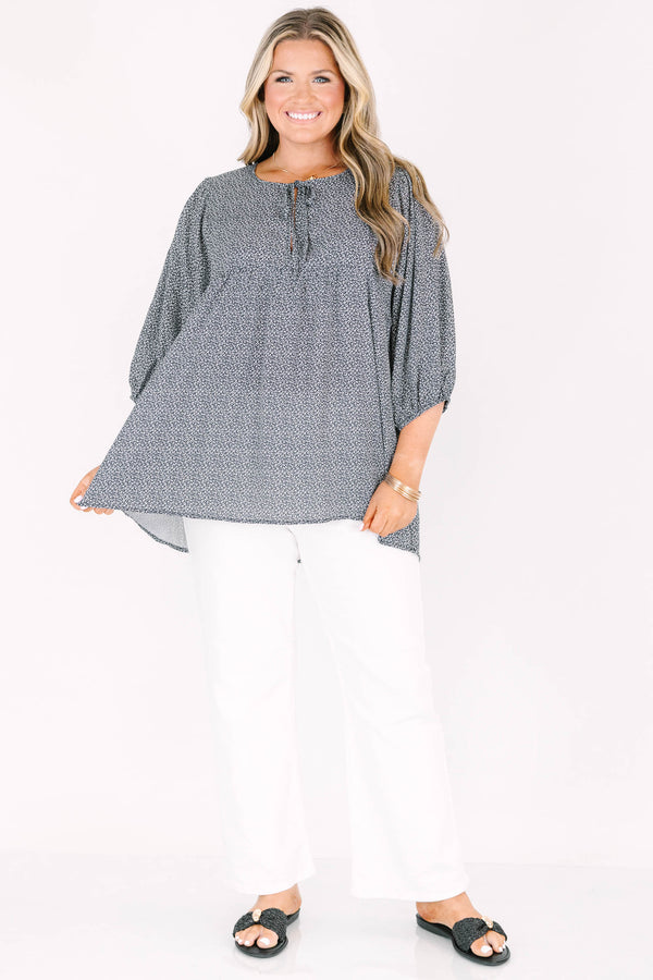 Chic Soul plus size clothing, black top with white pattern and bubble sleeves