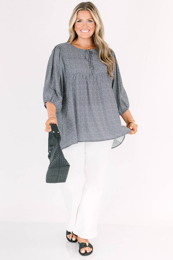 Chic Soul plus size clothing, black top with white pattern and bubble sleeves