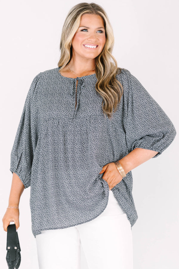 Chic Soul plus size clothing, black top with white pattern and bubble sleeves