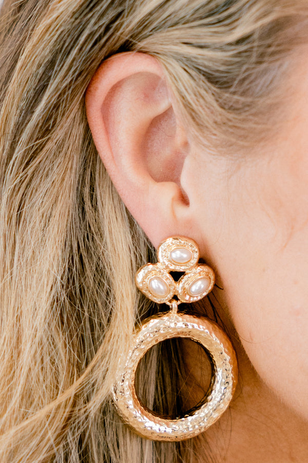 Chic Soul plus size clothing, gold earing that has a pearl stud and a hoop hanging off the stud 