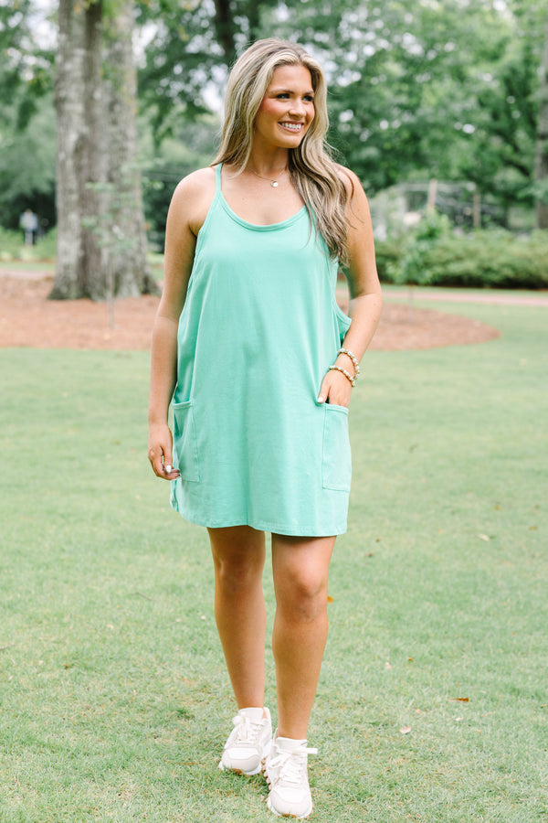 Chic Soul plus size clothing, green strapless active dress with shorts underneath and two front pockets at the bottom of the dress