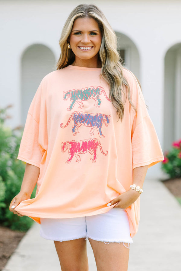 Plus Size neon coral oversized boyfriend tee with three colorful graphic tigers and white shorts.