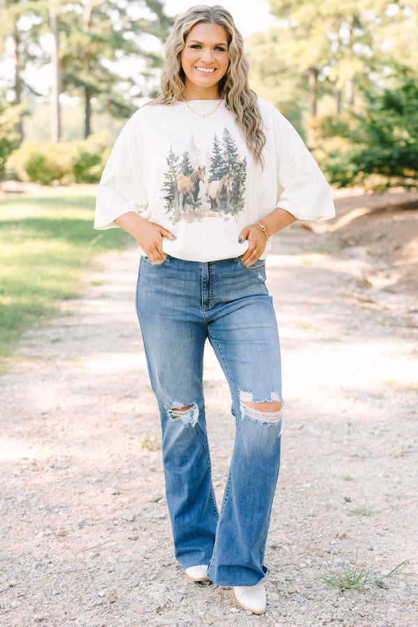 Plus Size ivory boyfriend tee in 100% cotton with a vintage horse and forest graphic.