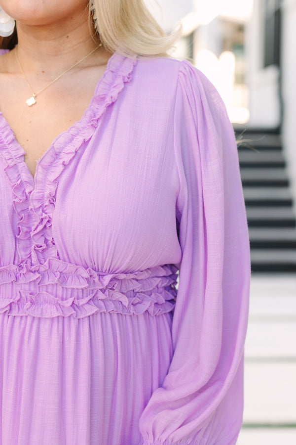 Chic Soul plus size clothing, lavender maxi dress with long bubble sleeves that have a ruffle detail at the ends of them as well as ruffle detailing on the tiers of the dress around the waist and going along the v-neckline 