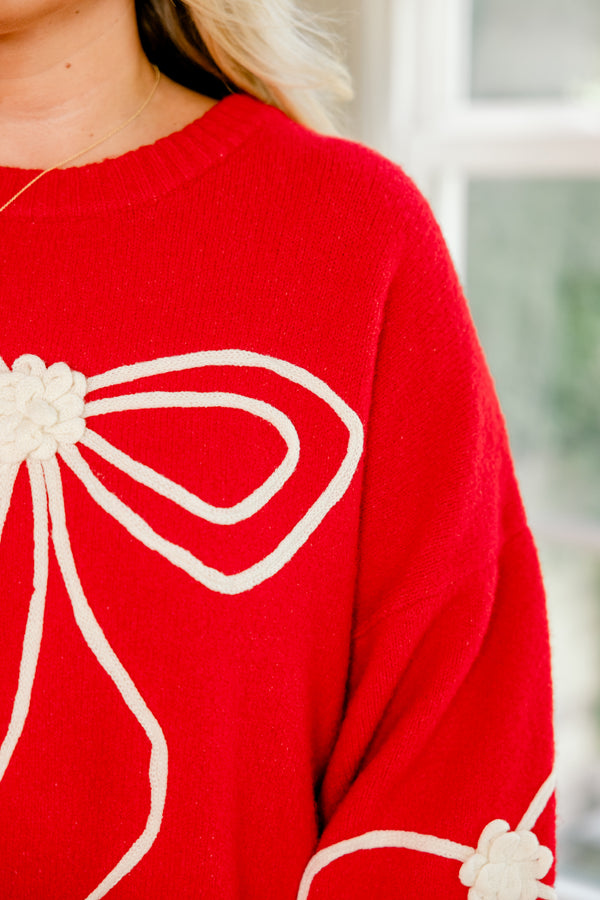 Chic Soul plus size clothing, red long sleeve sweater with frilly arm cuffs and three white bow outlines threaded into sweater