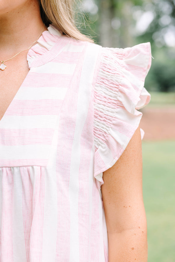 Plus Size pink and white striped dress with ruffle cap sleeves and a V-neckline.
