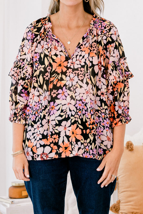 Chic Soul Plus size Clothing, Black multi-colored long sleeve top with a floral pattern and a slight v-neckline 
