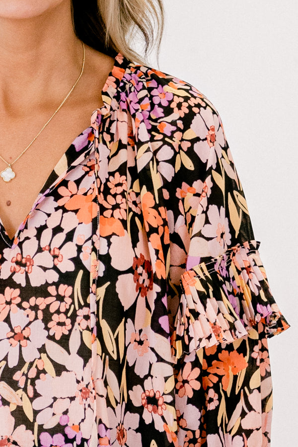 Chic Soul Plus size Clothing, Black multi-colored long sleeve top with a floral pattern and a slight v-neckline 
