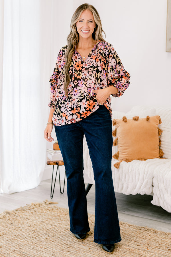 Chic Soul Plus size Clothing, Black multi-colored long sleeve top with a floral pattern and a slight v-neckline 
