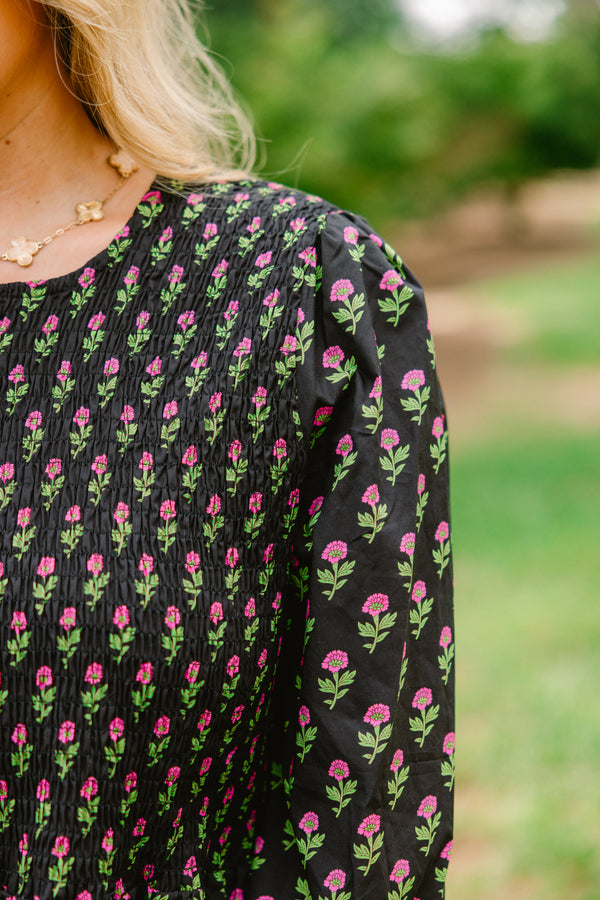 Chic Soul plus size clothing, black long bubble sleeve top with rouching on the chest and flowy peplum bottom and pink floral print