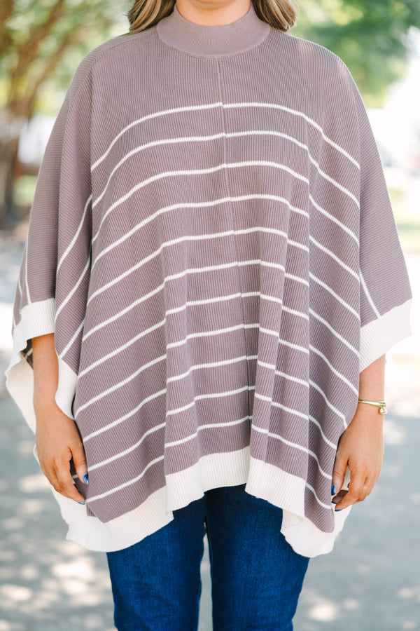 Plus Size brown and white striped knit poncho with a mock neckline and wide sleeves.