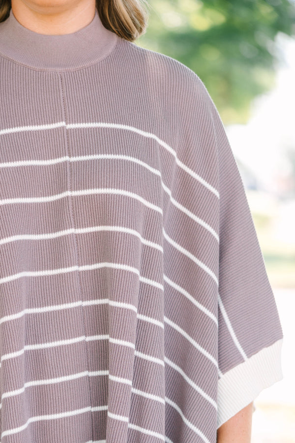 Plus Size brown and white striped knit poncho with a mock neckline and wide sleeves.