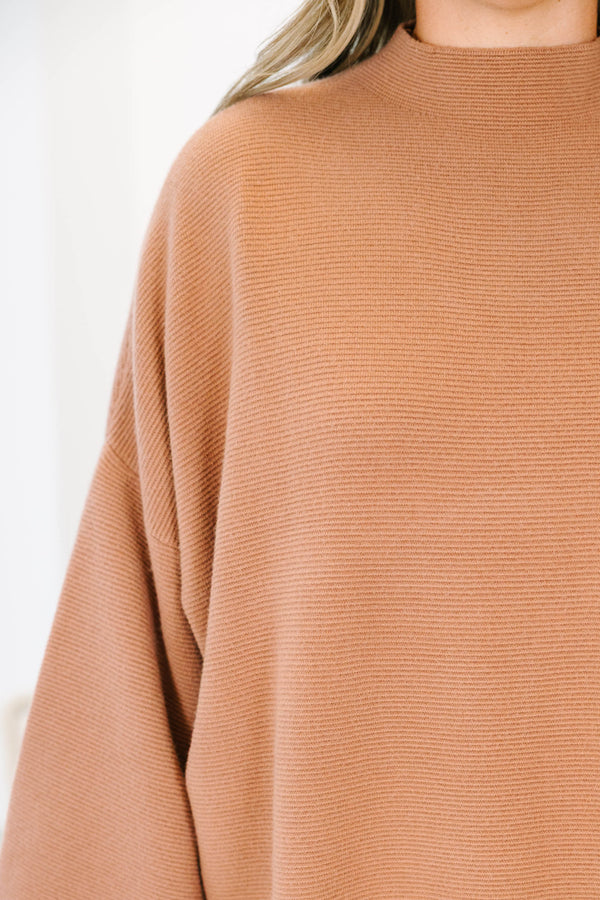 Plus Size brown ribbed knit sweater with a mock neckline and relaxed dolman sleeves.